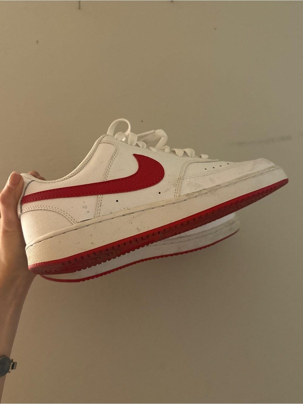 Nike White Low-Top Sneakers with Red Swoosh